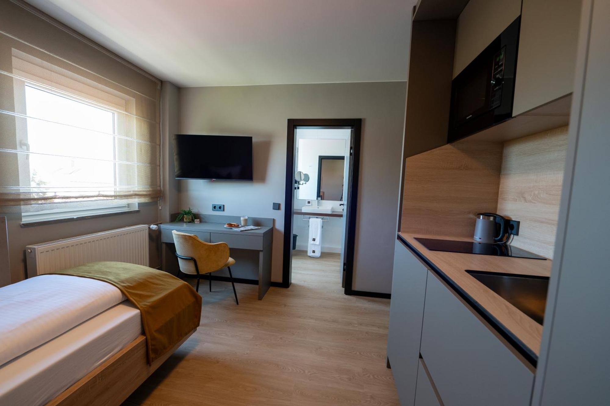 V Business Apartments Бёблинген Экстерьер фото